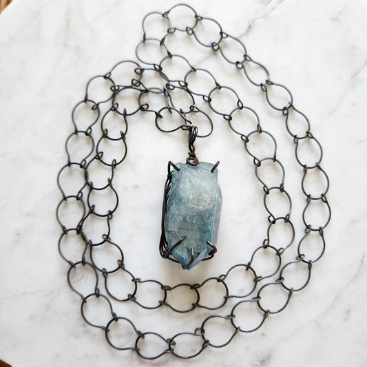 Celestial Forge Necklace - Oxidized Iron & Aqua Aura Crystal